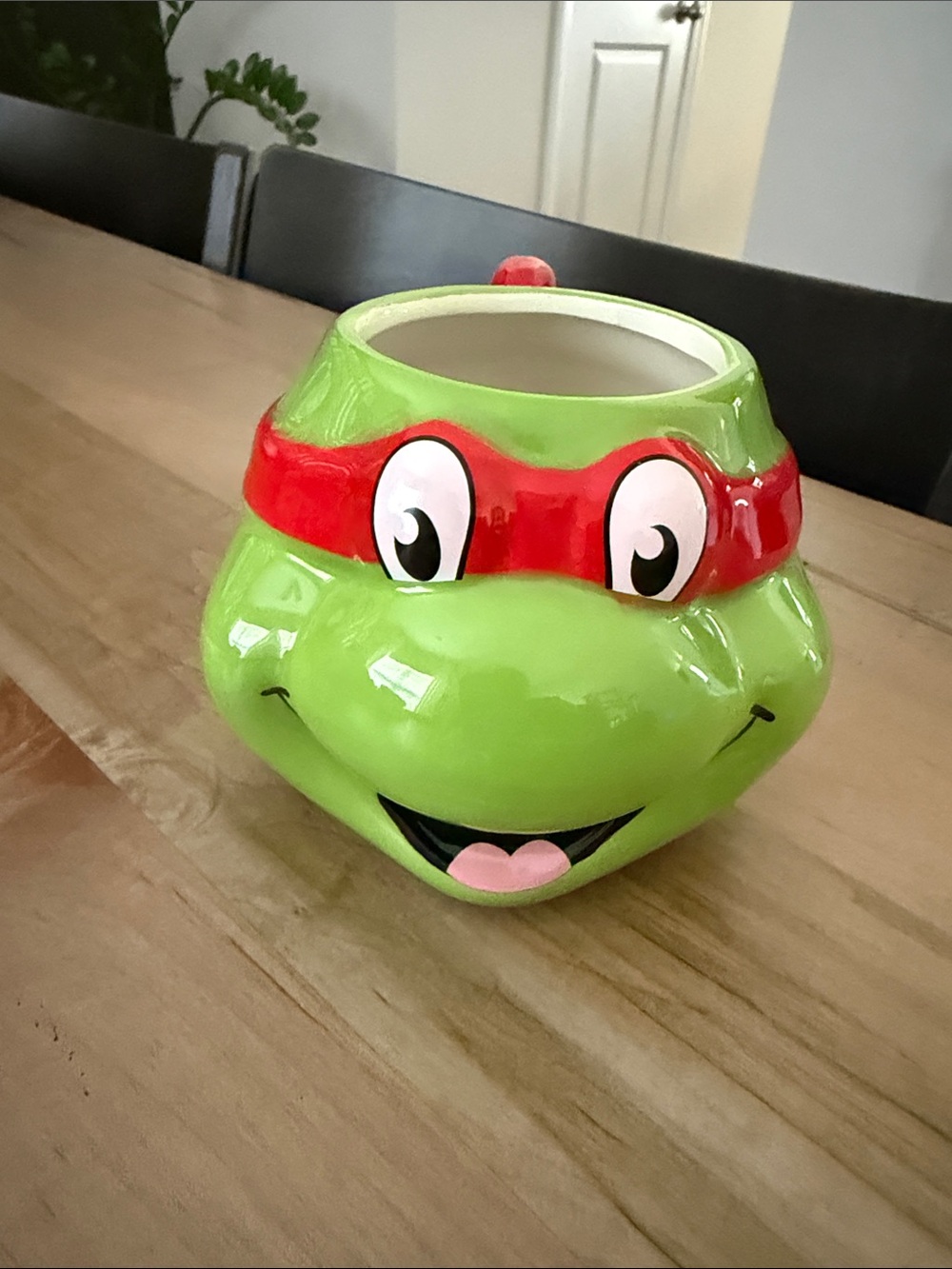 Green Turtle Character Ceramic Mug with Red Mask Accent